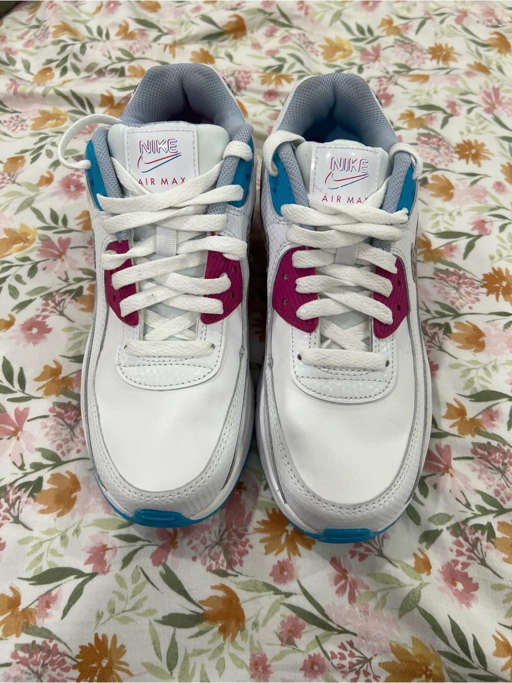Nike Kids White Sneakers with Pink and Blue Accents